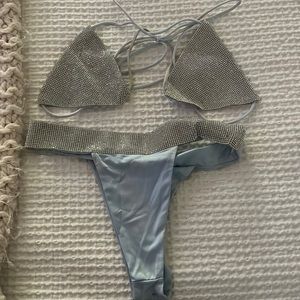 Sparkling bathing suit the bottoms band is a little twisted on the right side